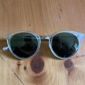 Oliver Peoples clear sunglasses with dark green lenses